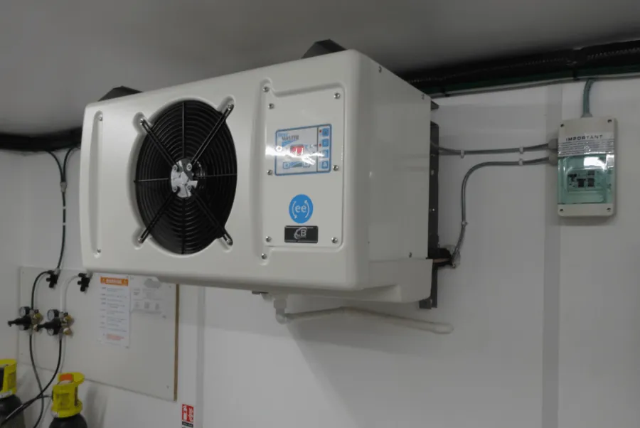 Wall-mounted cellar cooling unit installed in a beer cellar